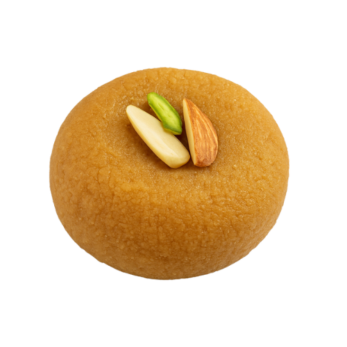 Thabdi Peda Indian sweet made from milk and jaggery, garnished with almond and pistachio slivers – traditional Gujarati mithai.